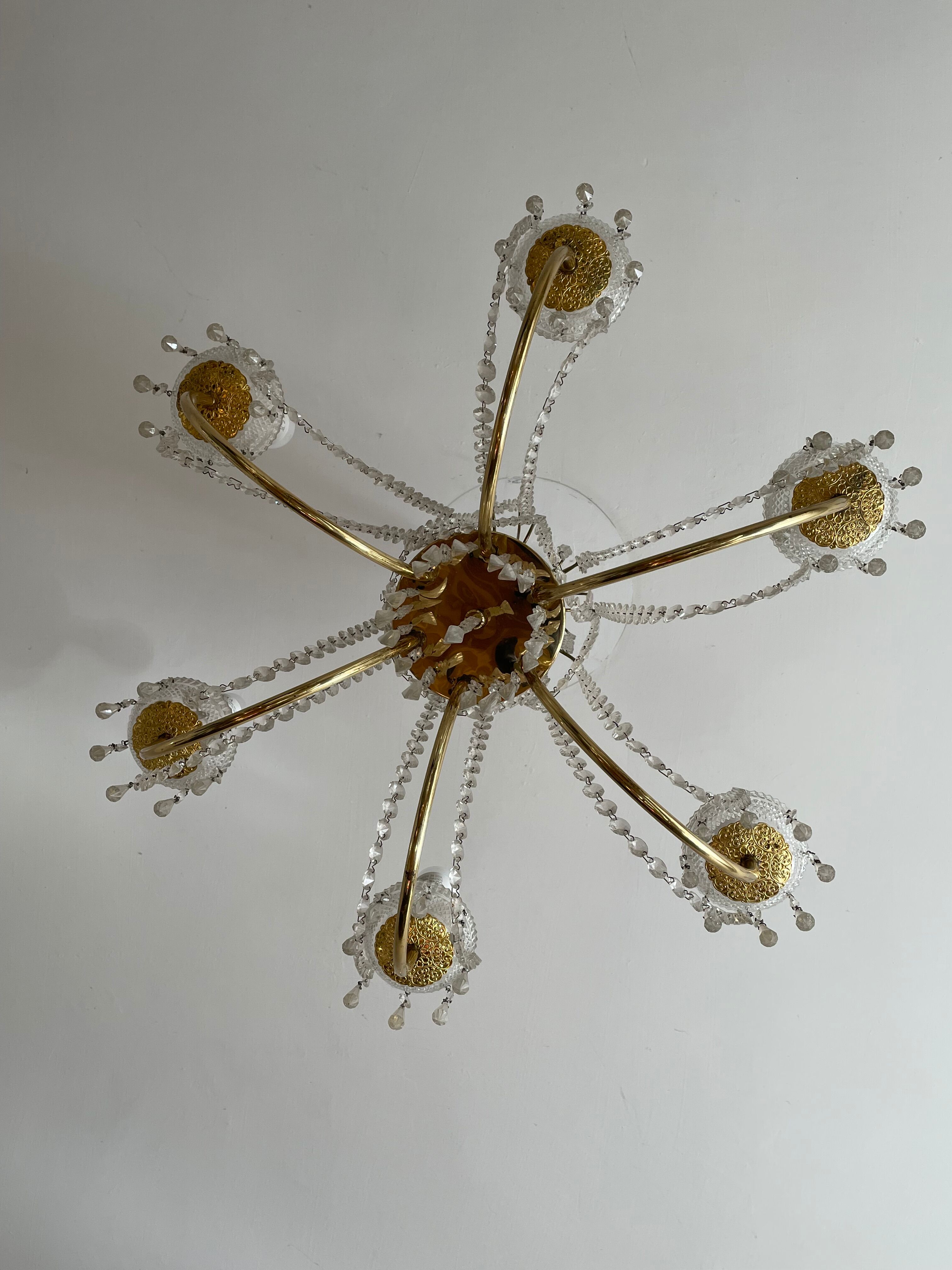 Chandelier with brass and glass grapevines