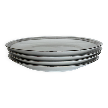 4 oval white porcelain dishes