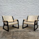 Set of two Baumann sled lounge chairs.