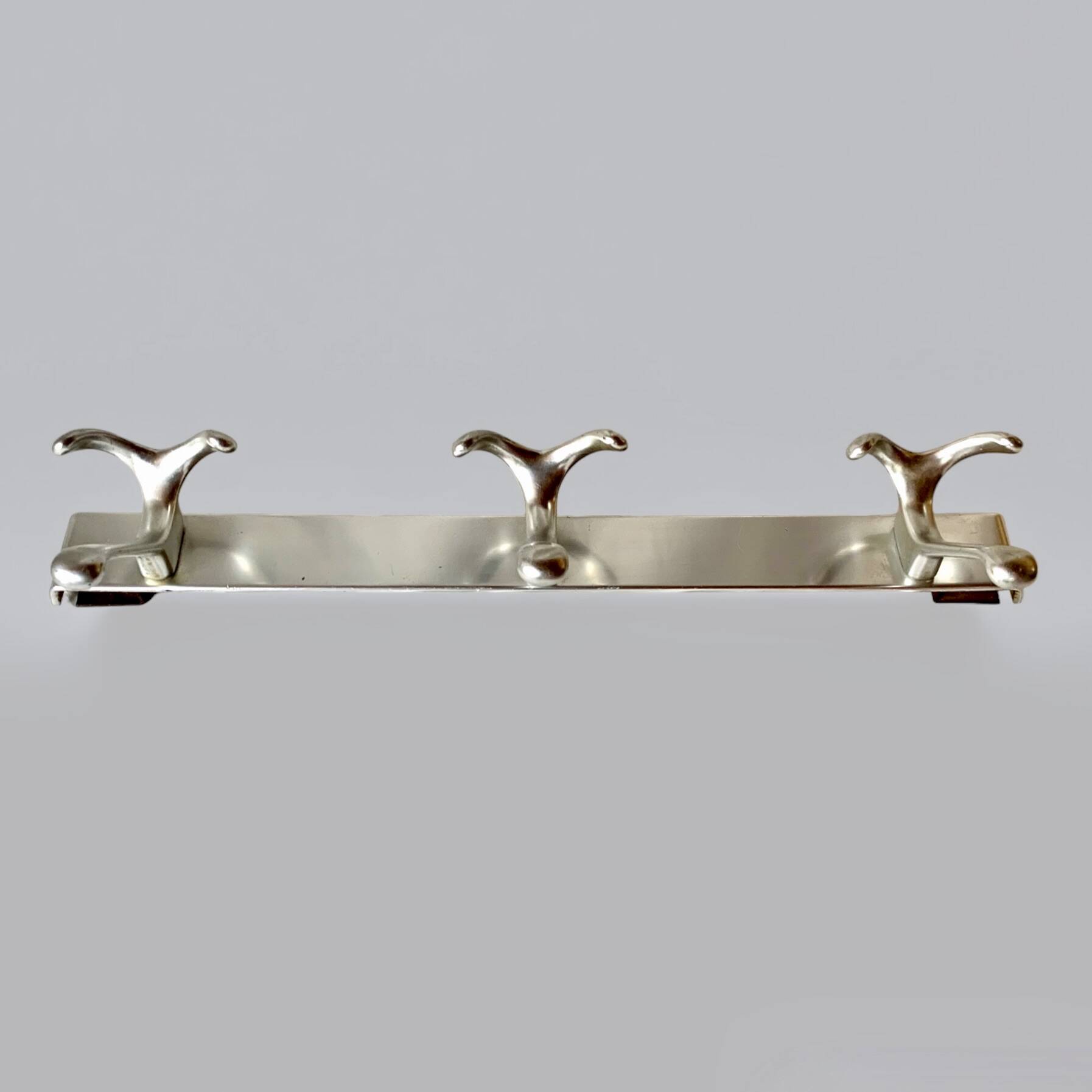 Vintage aluminum coat rack with three hooks