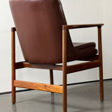 Fauteuil en cuir et bois de Ib Kofod Larsen