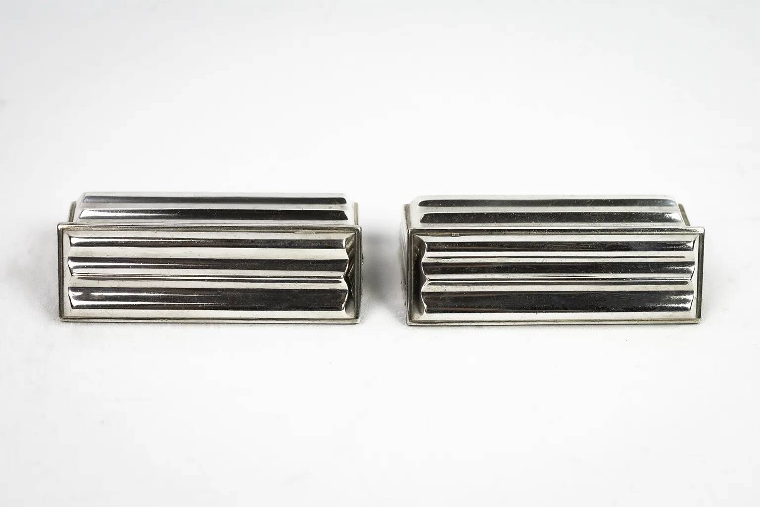 Christofle — 12 “Ondulations” knife rests by Luc Lanel, silver-plated metal