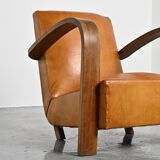 Art Deco club armchair in Havana leather, around 1940.
