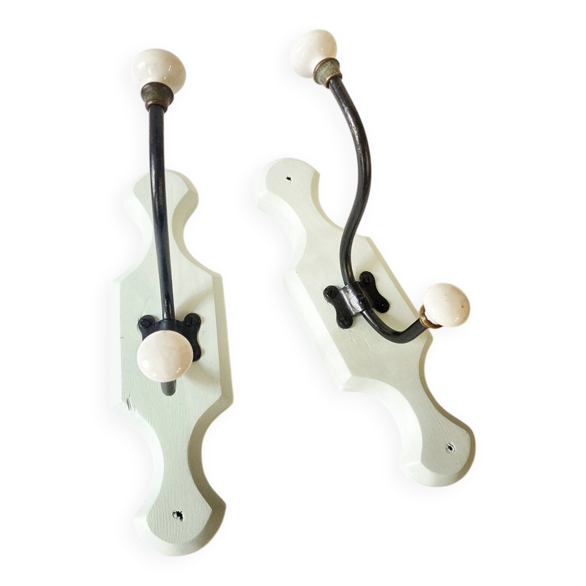 Antique metal and porcelain coat hooks, painted wooden support