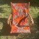 Vintage beach or garden chair made of wood and floral fabric, 1970s.