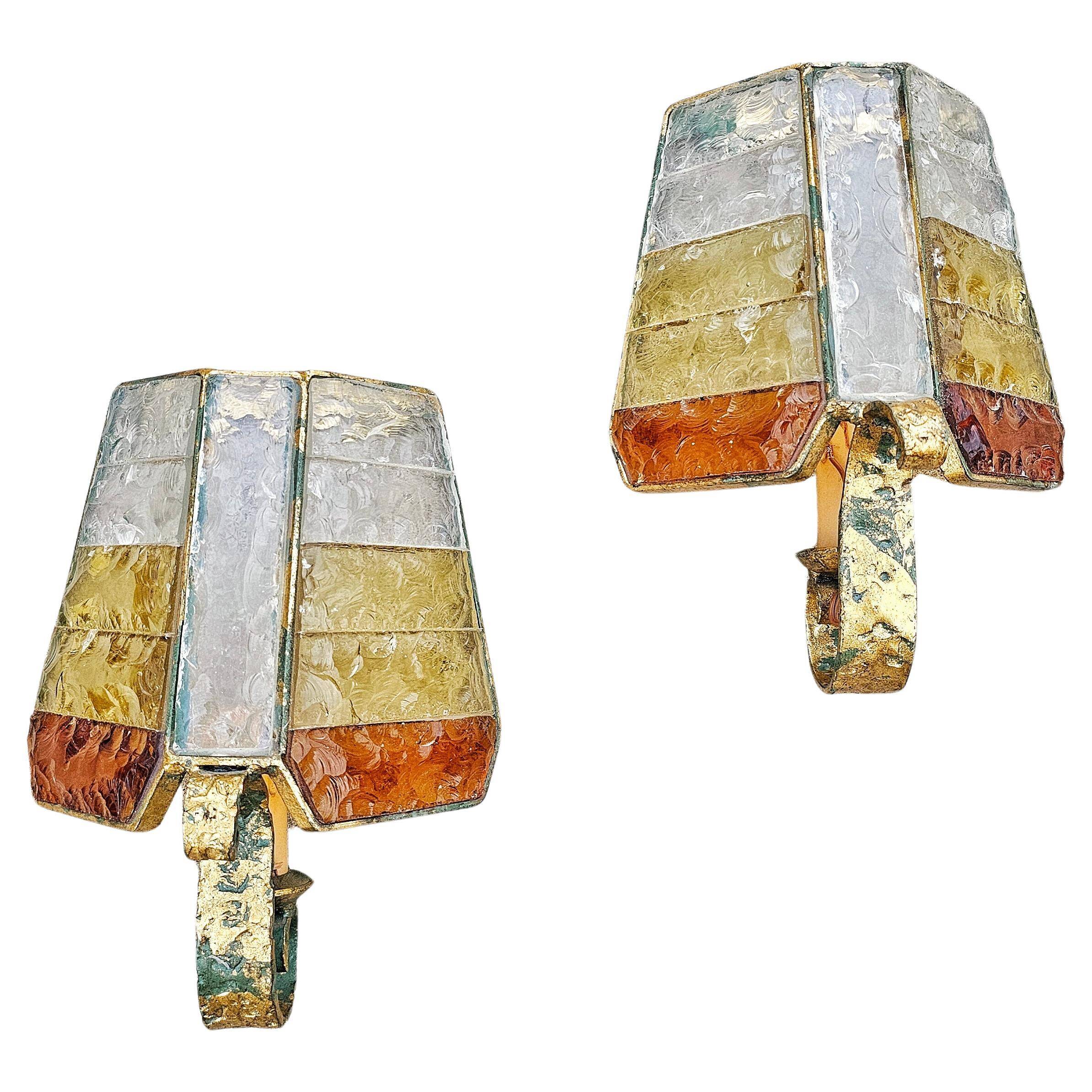 Brutalist pair of wall sconces in hammered glass by Longobard 1970.
