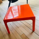 Small orange fiberglass side table from the 70s