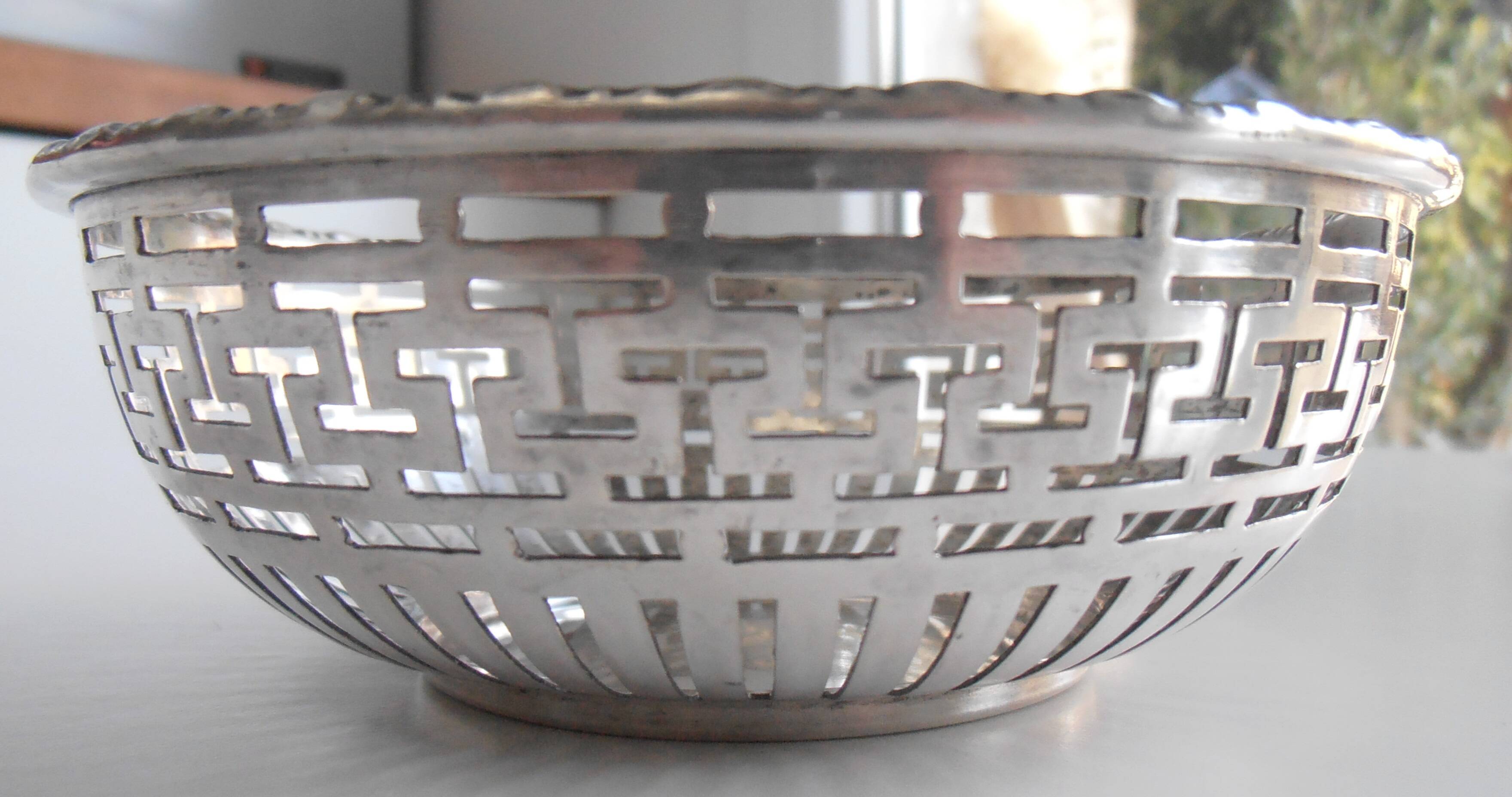 Old silver-look metal basket cup from the 1930s nickel silver