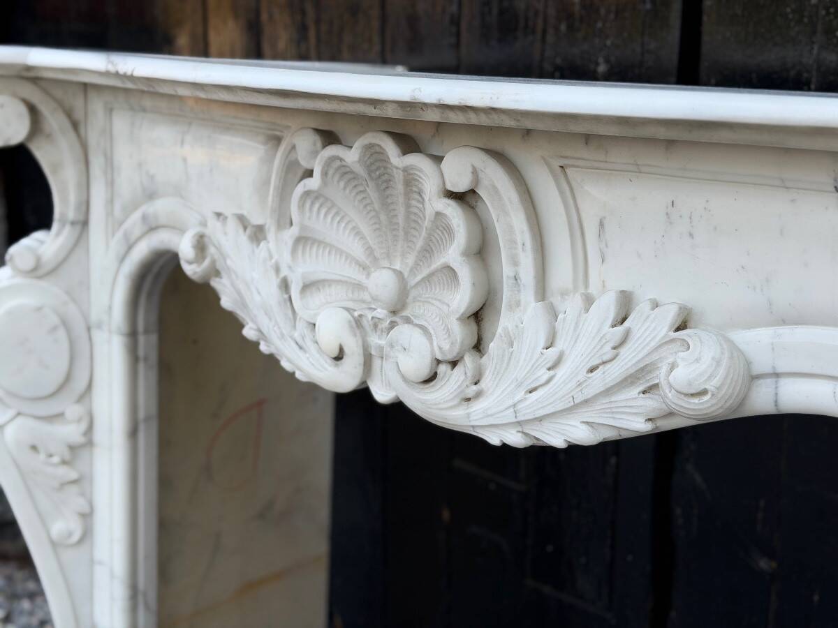 Louis XV style fireplace in Carrara marble, circa 1980.