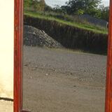 Large antique mirror in a flame mahogany frame; 132x82 cm