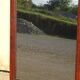Large antique mirror in a flame mahogany frame; 132x82 cm