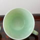 Ancienne tasse et sa soucoupe en opaline vert menthe