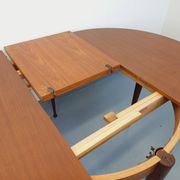 Round dining table in vintage Scandinavian style from the 50s and 60s in teak.