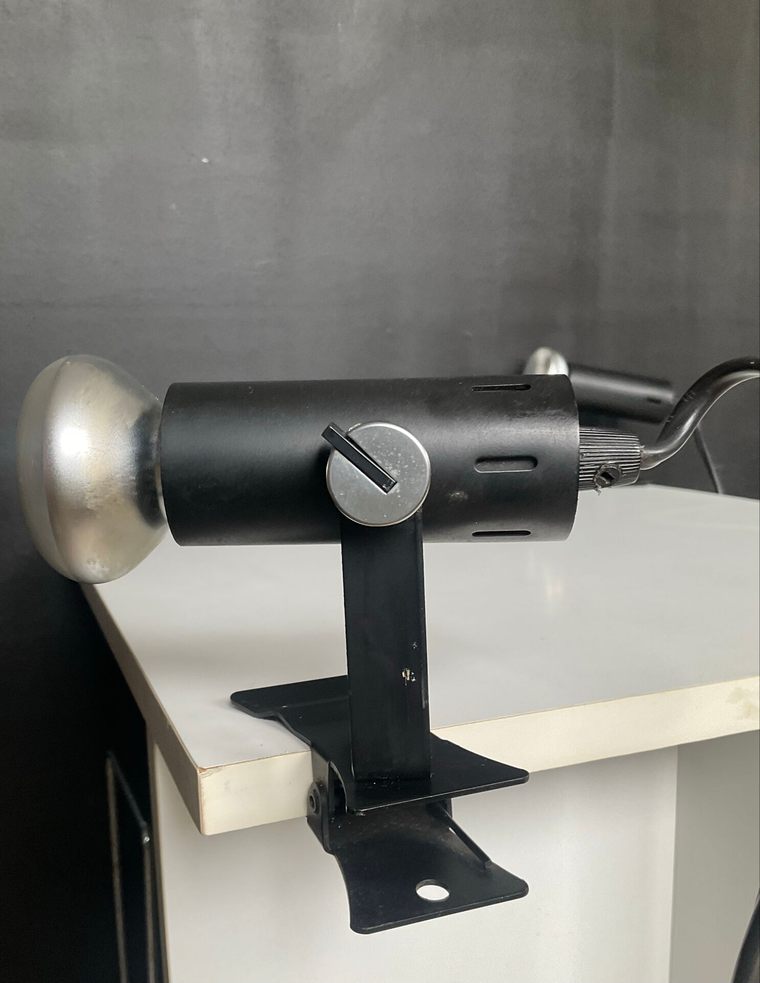 A pair of clamp lamps from the 1970s.
