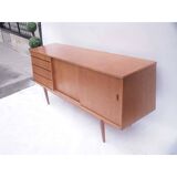 Vintage Scandinavian enfilade with a slanted façade.