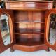 Curved display cabinet from the Napoleon III era in mahogany, circa 1850.