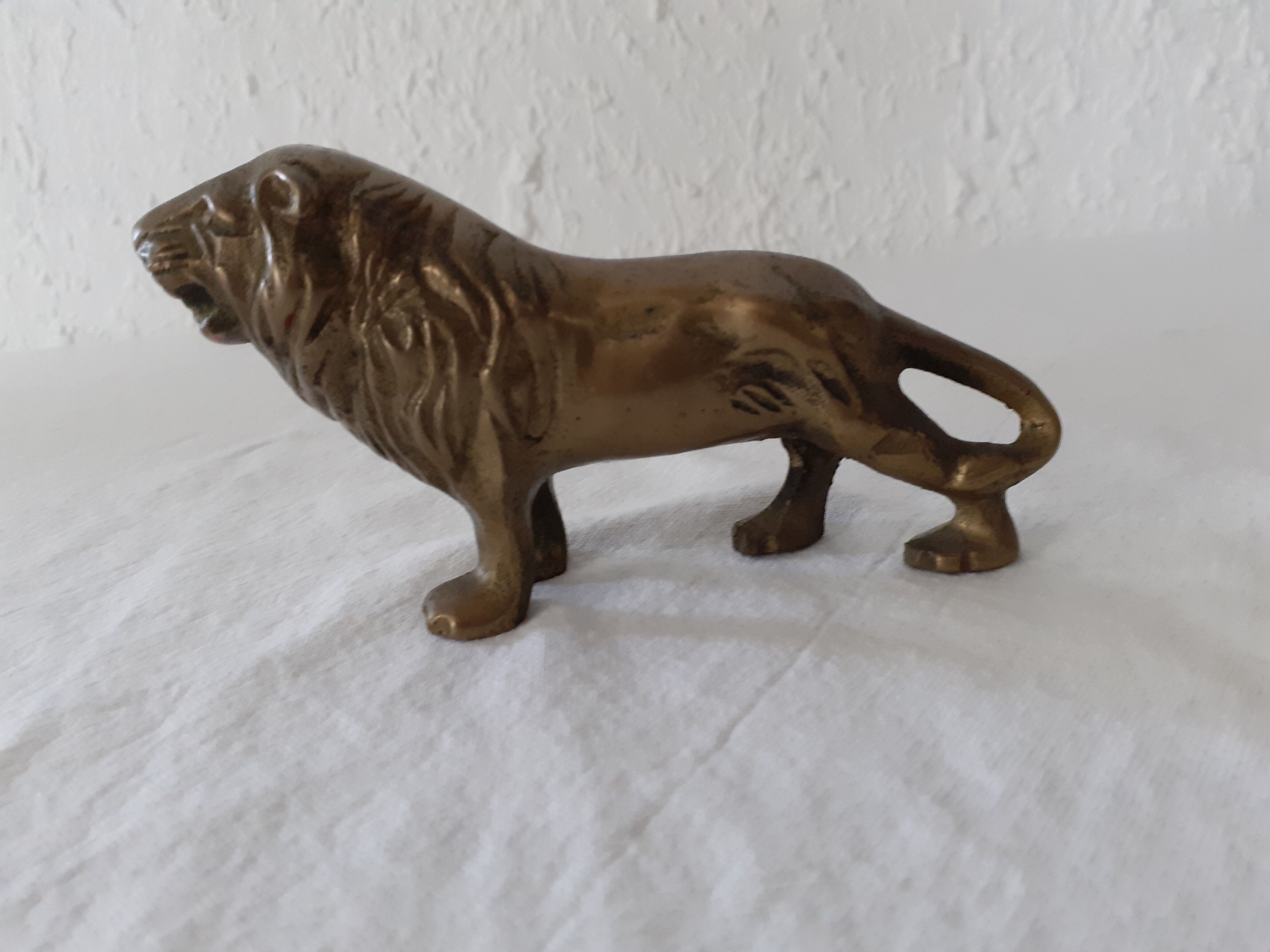 Animal lion in brass or bronze