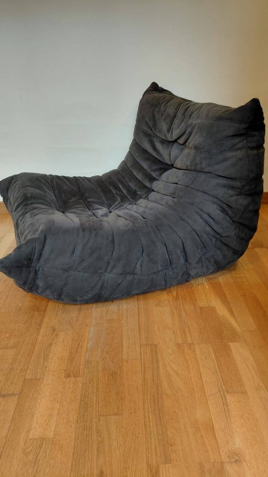 Togo armchair by Ligne Roset in anthracite alcantara.