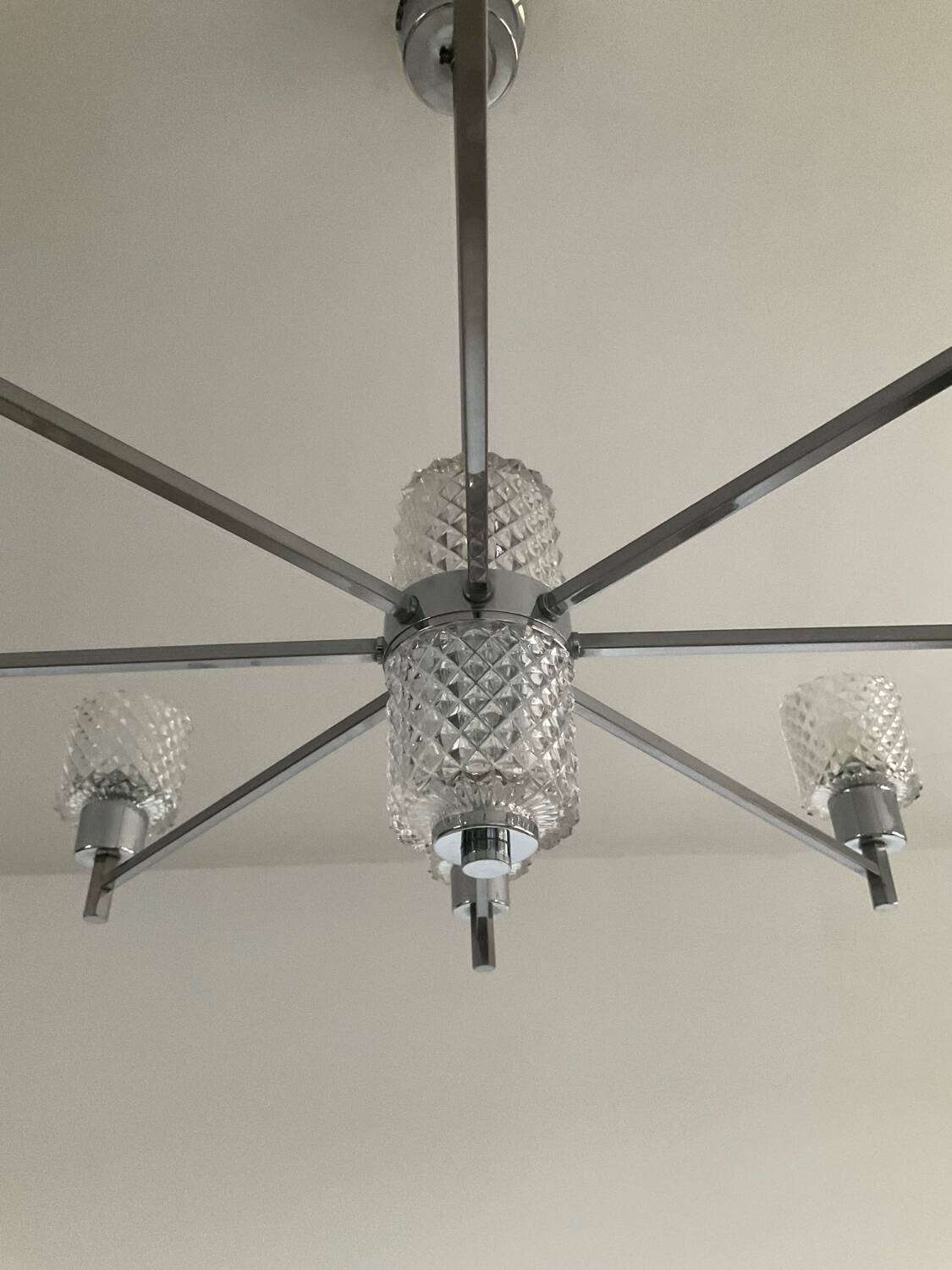 Vintage Italian chandelier from the 60s in chromed metal and glass