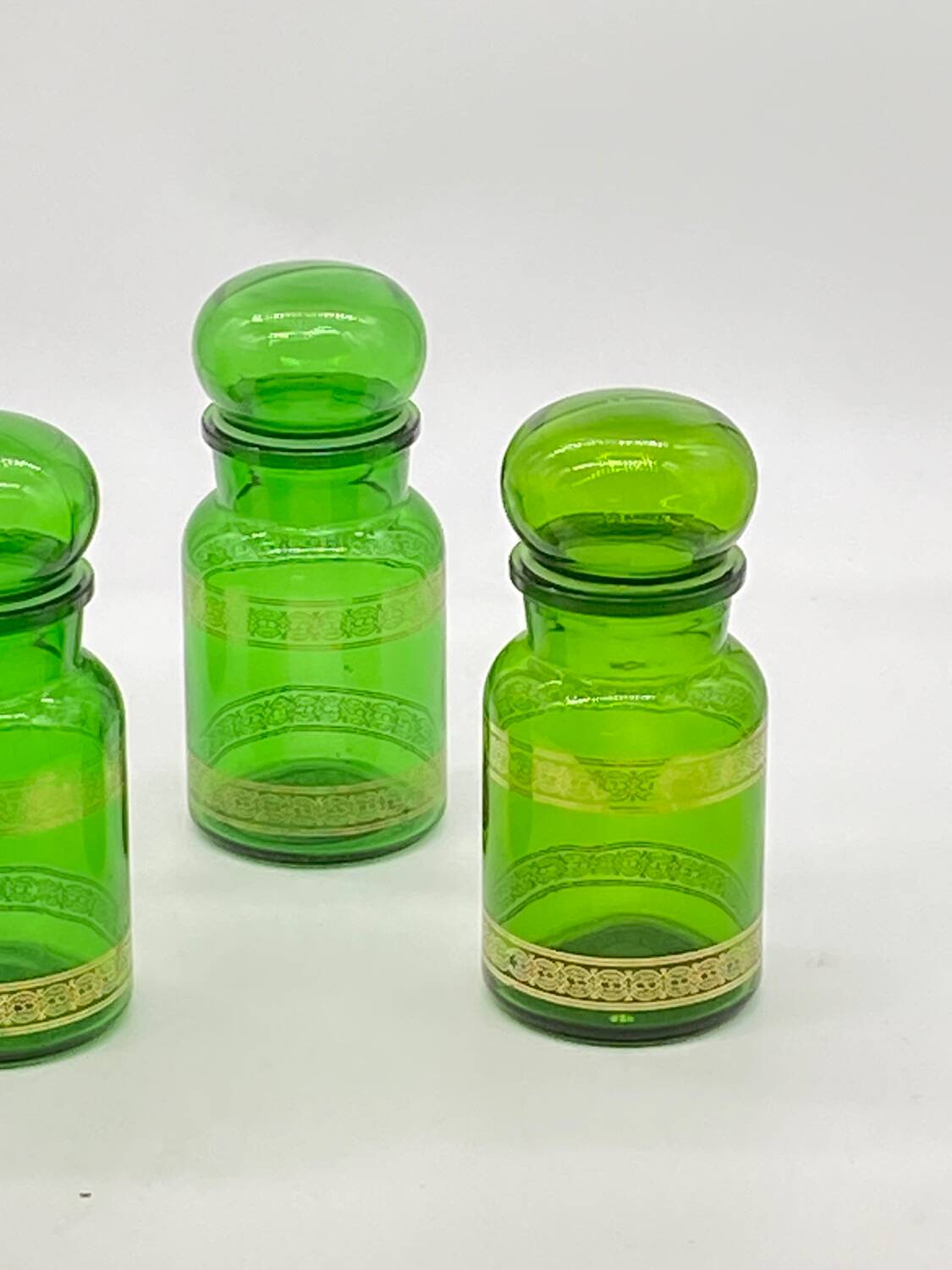 Series of 4 vintage green glass jars, Belgium,