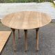 Renovated Louis Philippe round extendable dining table with leaves from the 18th century.