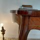 Flying table in Louis XV style with floral marquetry and bronze fittings.