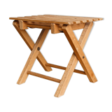 Lathy folding stool made of wood