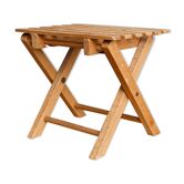 Lathy folding stool made of wood