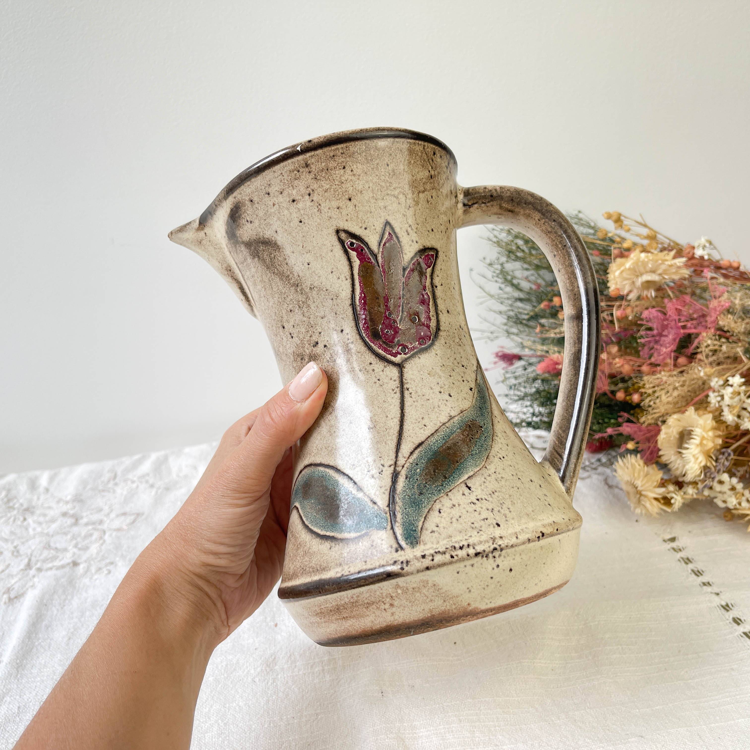 Ceramic pitcher from Les grottes dieulefit with floral pattern from the 1970s