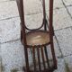 old bistro chair with varnished wooden bars