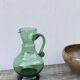 Vintage green blown glass pitcher