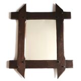 Rectangular mirror with bevelled wooden frame, 1970s.