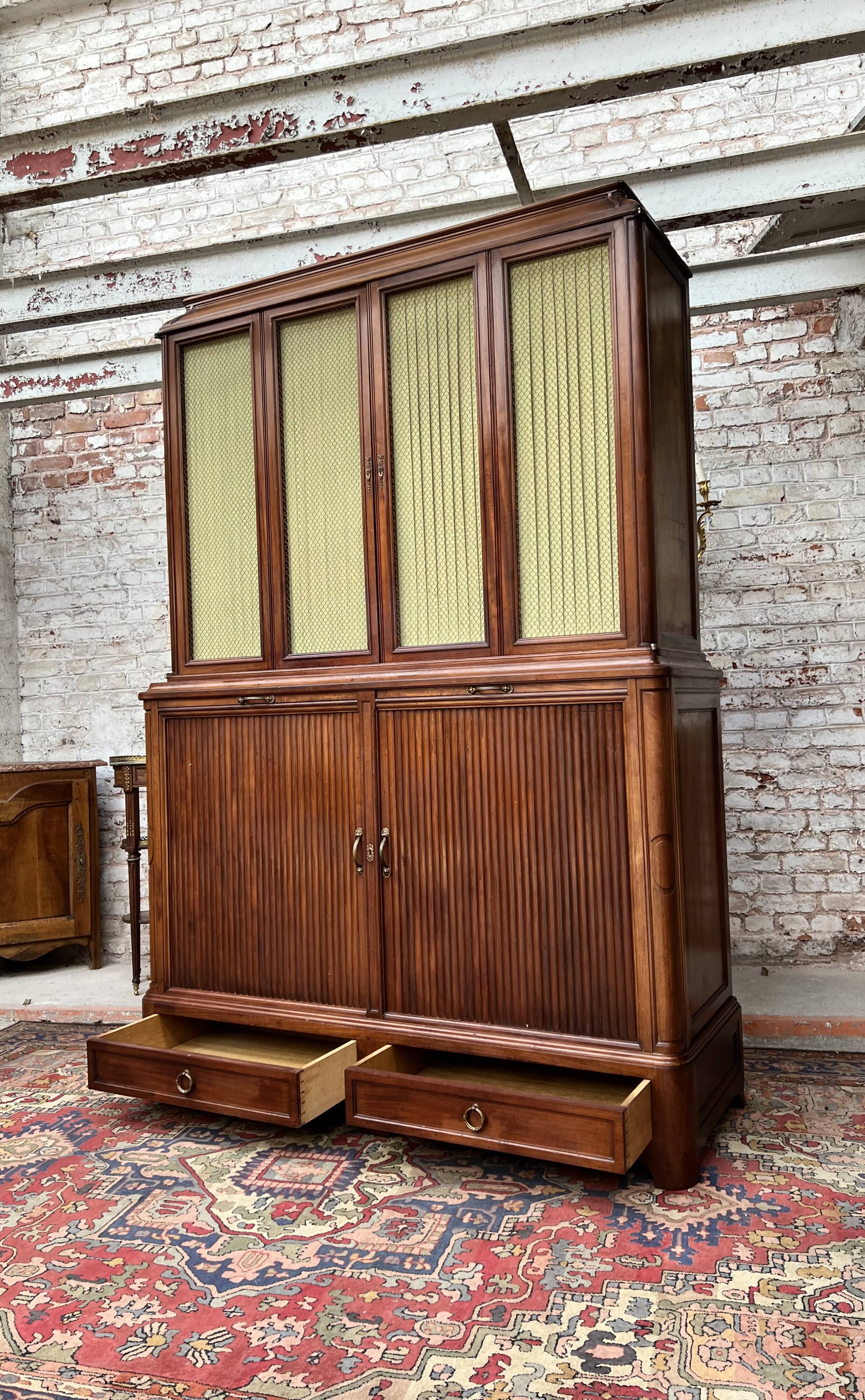 Large mahogany library in Louis XVI style stamped from the Bettenfeld House in Paris.