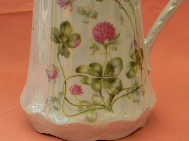 Art Nouveau pitcher in German porcelain.