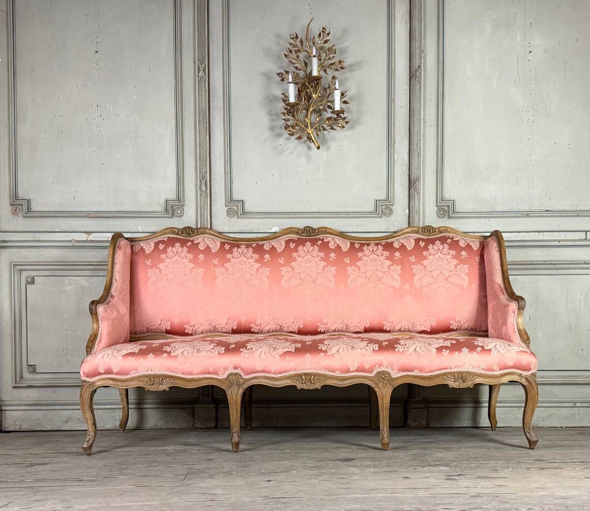 Louis XV bench in carved natural wood, 18th century