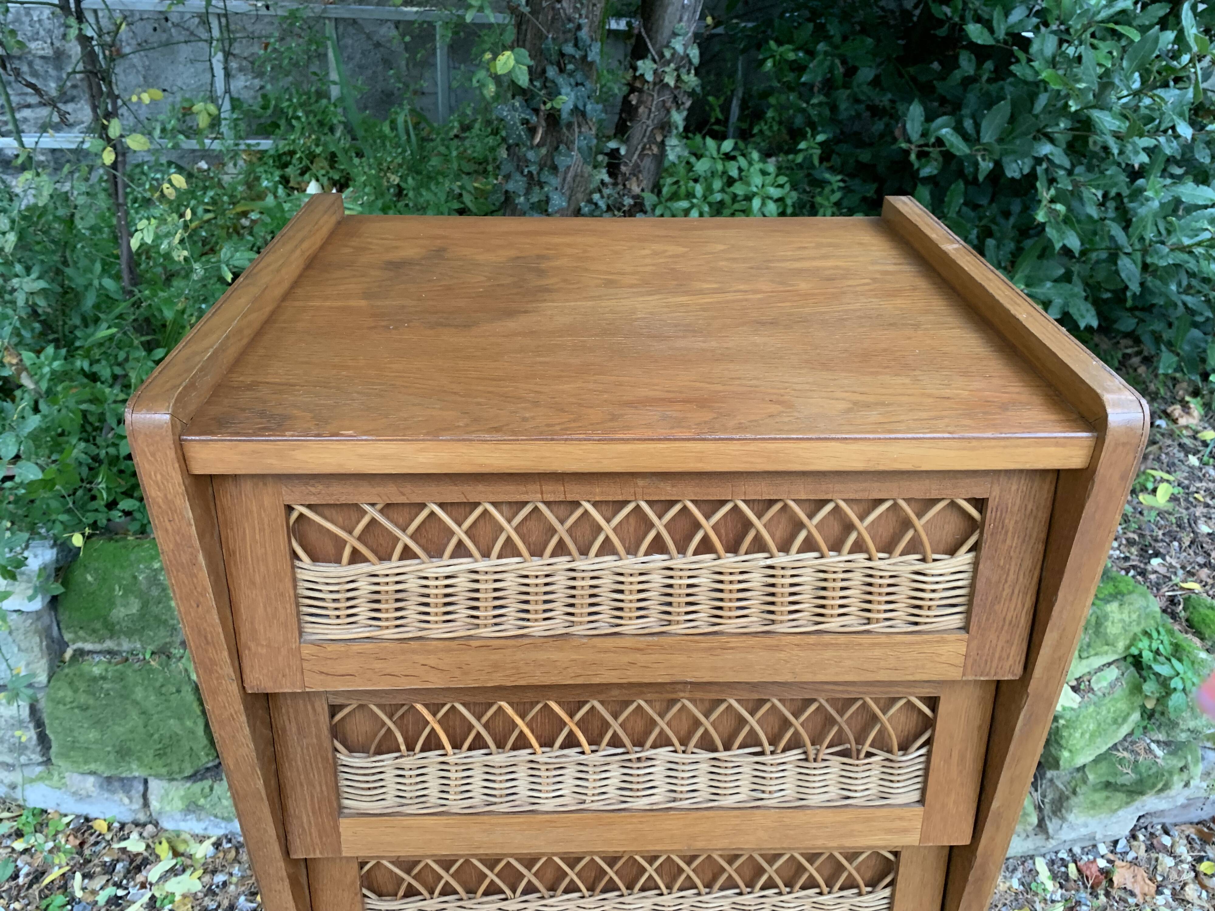 Vintage rattan chiffonier with compass feet 1950