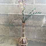 Glass and rattan vase