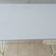 Industrial high table made of metal and formica.