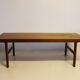 Table basse en teck avec feuille d'extension noire, design danois, années 1960.