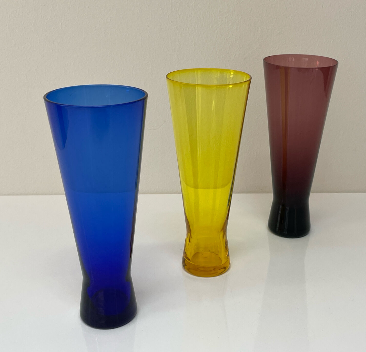 Set of three vintage coloured glasses from the 70s.