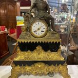 Pendulum in gilded bronze and onyx