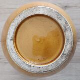 Orange glazed ceramic pitcher