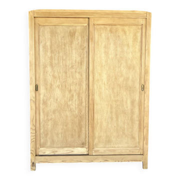 Sliding door wardrobe in raw wood