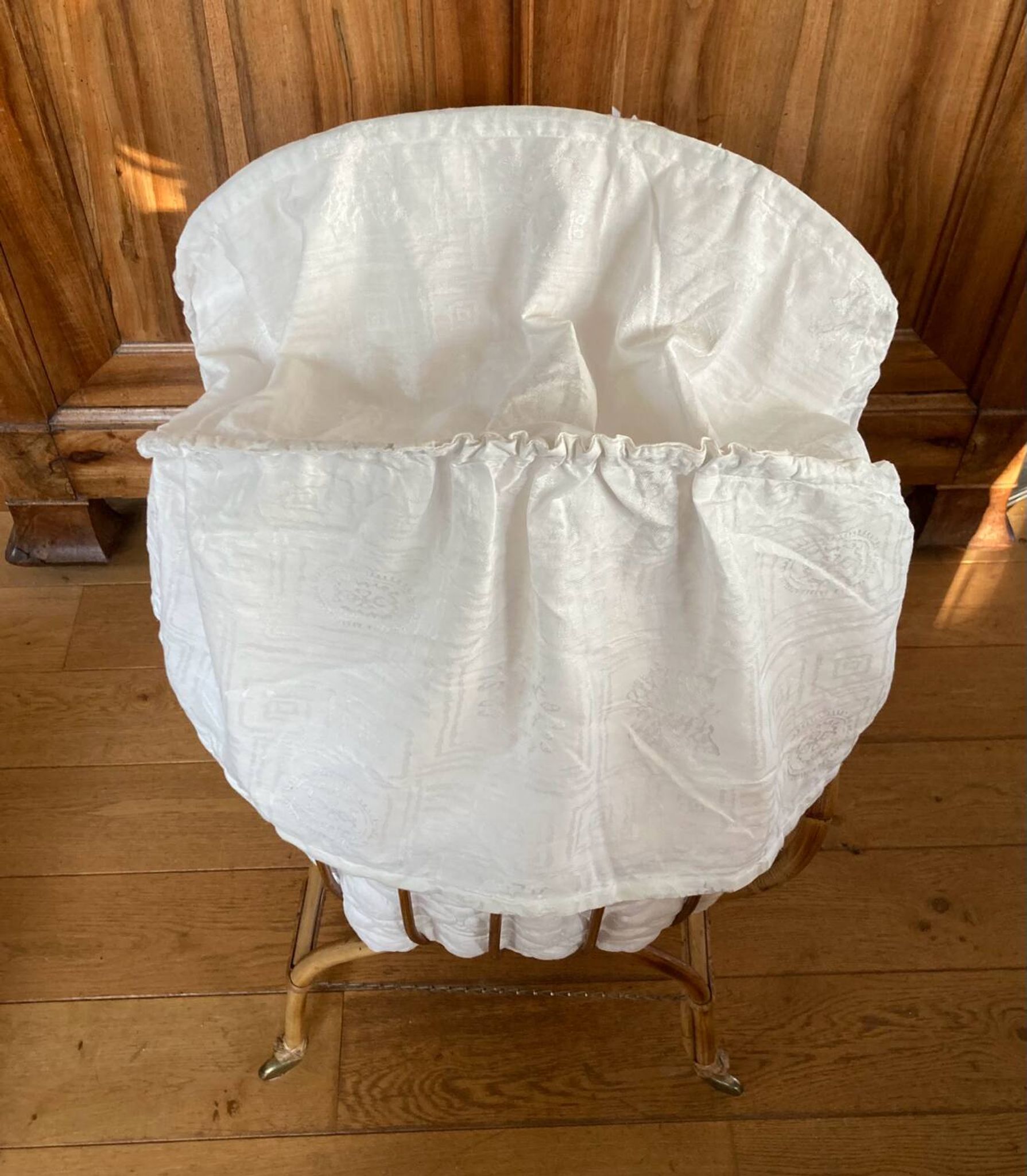 Bamboo, rattan, wicker cradle bassinet from the 1960s with a foldable support.