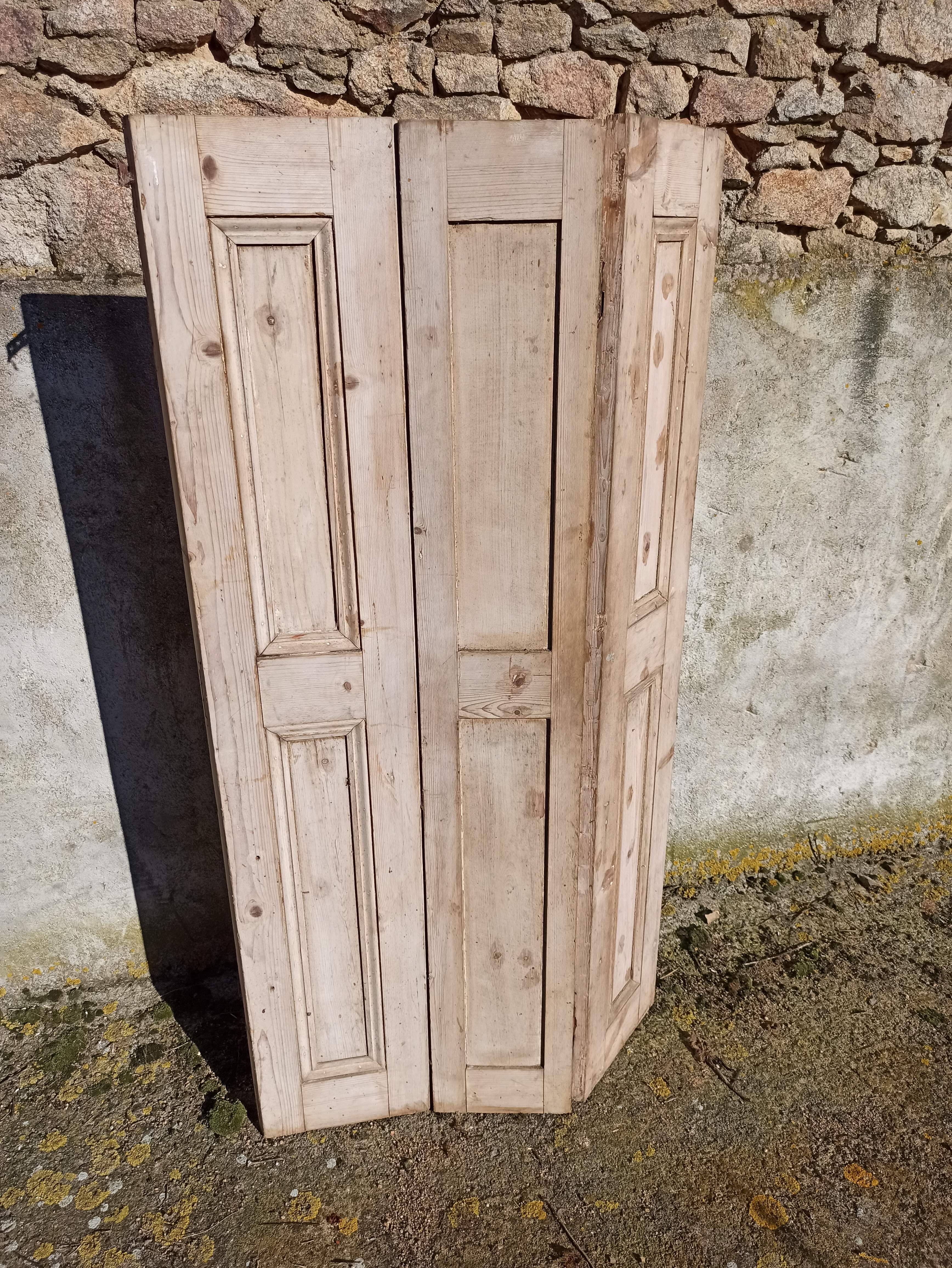 Old trio of wooden screen doors