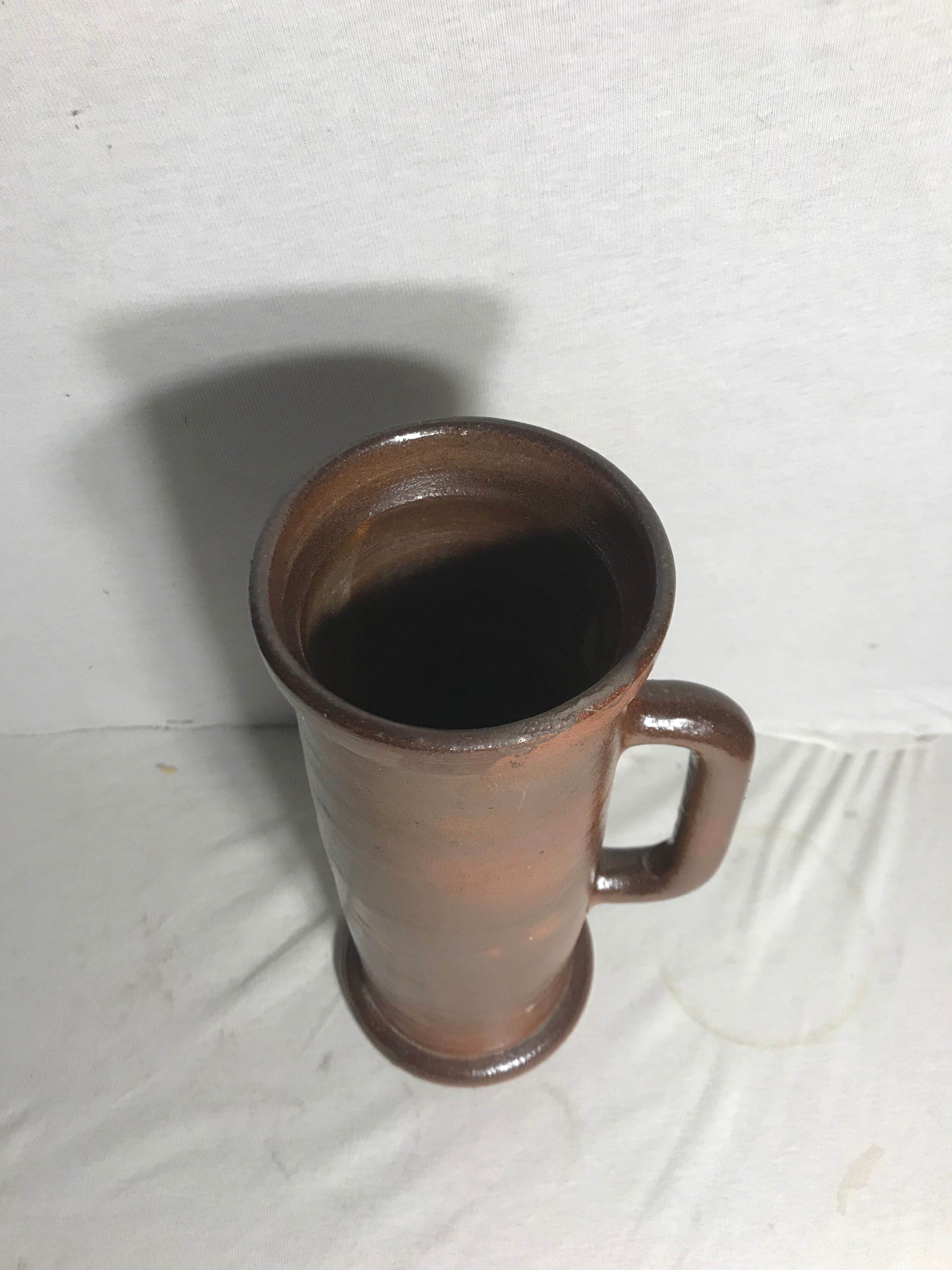 Old pitcher top in brown sandstone 70s