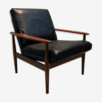 Fauteuil vintage en cuir datant des années 60