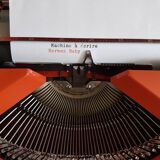 Hermes Baby orange typewriter, portable, functional