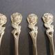 Small golden spoons with punch