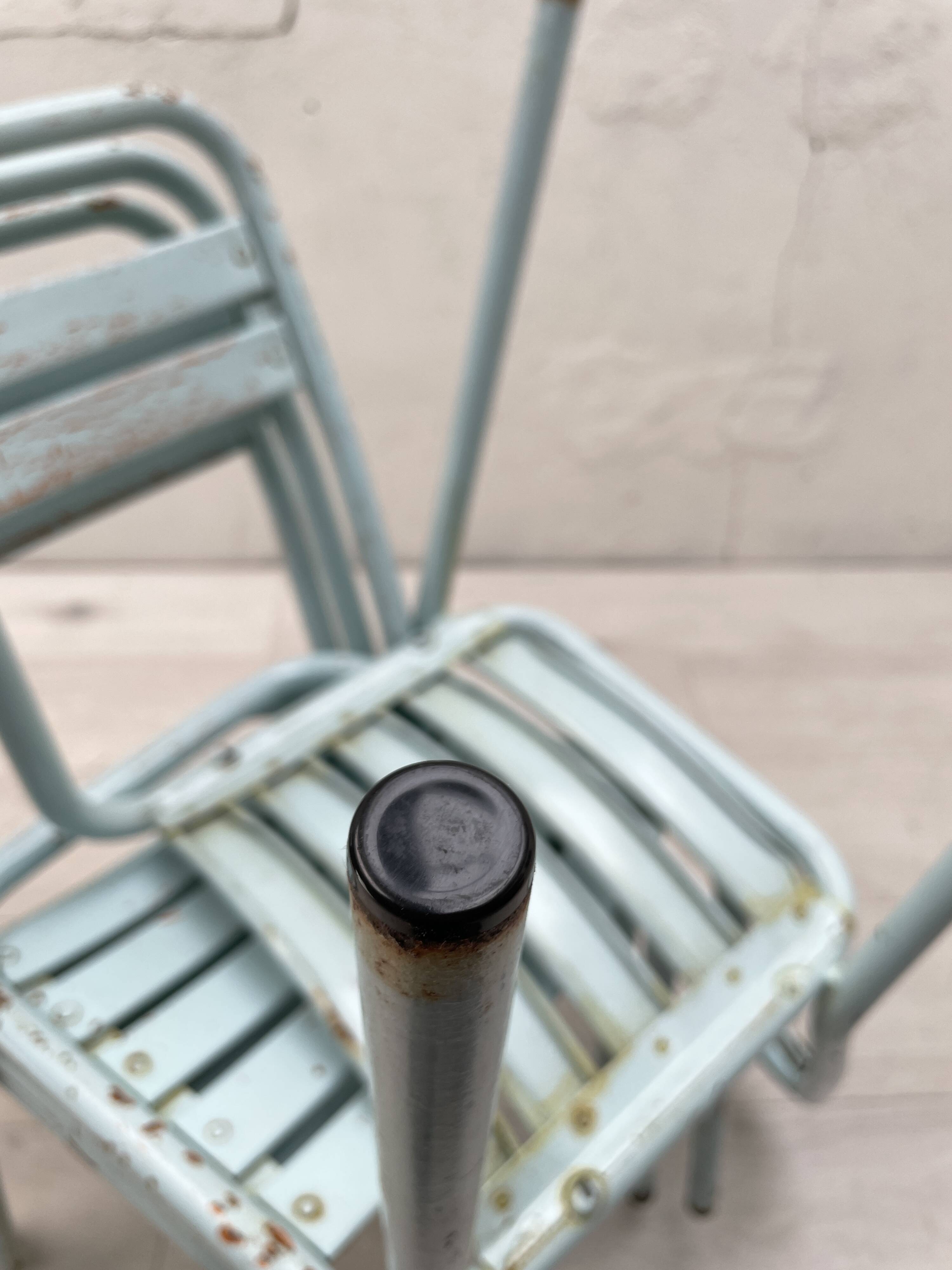 Set of four Tolix T2 chairs, circa 1950.